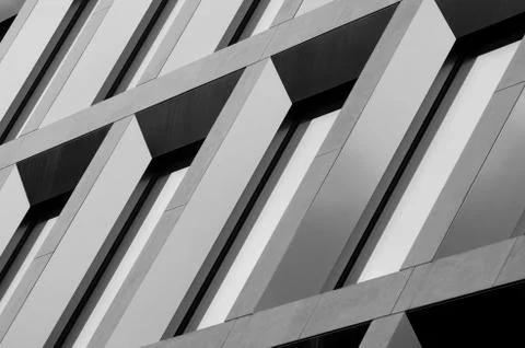 Geometric pattern from part of building facade. Modern architecture of Stock Photos