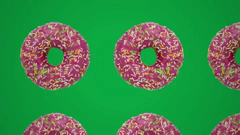 Geometric pattern with pink candy donuts on a green background Stock Footage 153817447