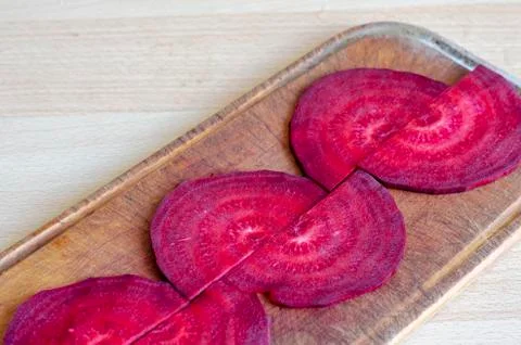 Geometric pattern of raw beet slices. Stock Photos