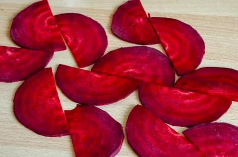 Geometric pattern of raw beet slices. Stock Photos