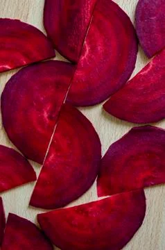 Geometric pattern of raw beet slices. Stock Photos