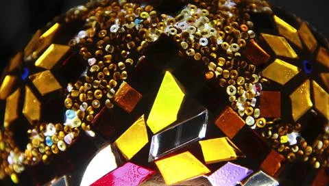 Geometric pattern of small pieces of multicolored glass mosaic Stock Photos