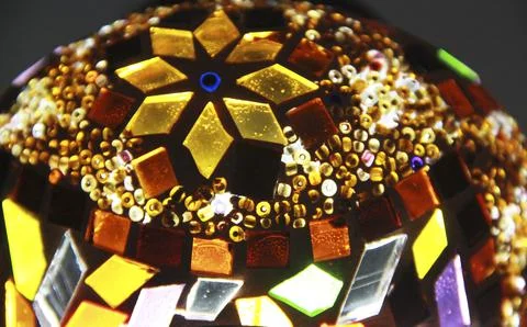 Geometric pattern of small pieces of multicolored glass mosaic Stock Photos