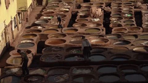 The geometric pattern of stone basins at Chouara Tanneries in Fez, Morocco Stock Footage 305667580