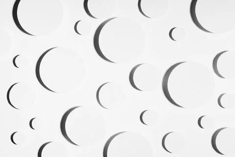 Geometric pattern of white circles in hard light with strict black contrast s Stock Photos