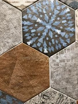 Geometric patterned tiles with hexagon shapes in various textures suitable .. Stock Photos