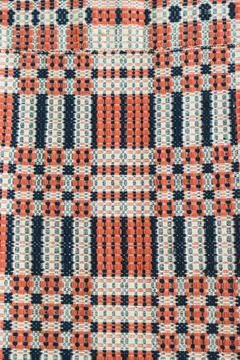Geometric patterned woven textile in red, blue, and white Stock Photos