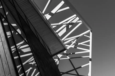 Geometric patterns cast dramatic shadows on a modern architectural design Stock Photos