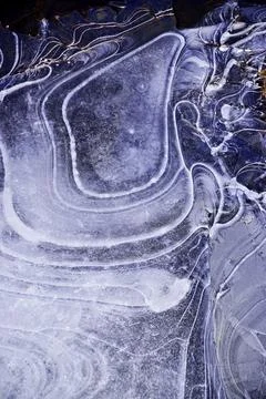 Geometric patterns in freezing ice Stock Photos
