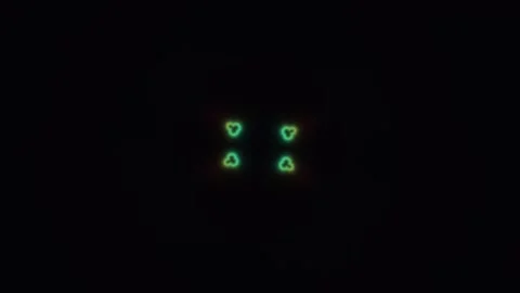 Geometric patterns in green light on a black background Stock Footage 338232228