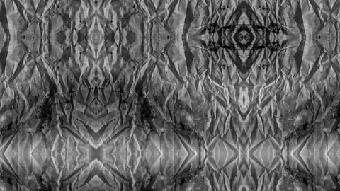 Geometric patterns swirl across abstract black and white background Stock Footage 328220592