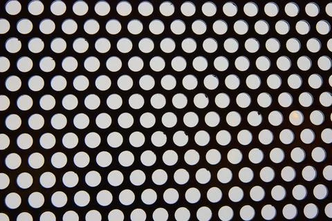 Geometric Polka Dot Pattern with Eye-Level Precision Stock Photos
