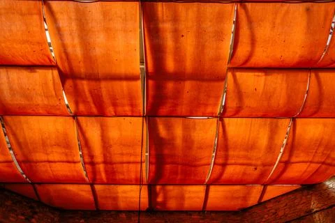 Geometric red canopy panels with sunlight shadows Stock Photos