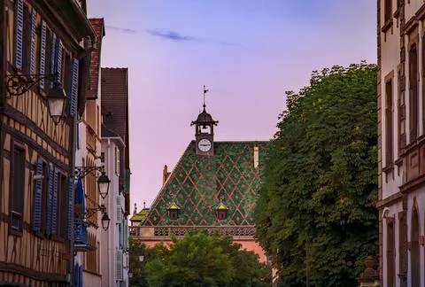 Geometric roof tiles pattern of the Koifhus building in Colmar, France at s.. Stock Photos