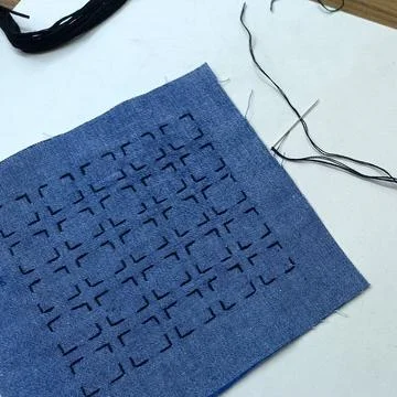 Geometric Sashiko Pattern Being Embroidered Stock Photos