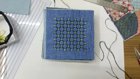 Geometric Sashiko Pattern on Fabric. Stock Photos