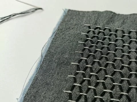 Geometric Sashiko Sampler on Fabric.  Stock Photos