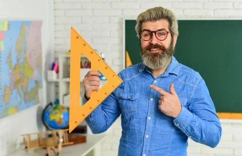 Geometric shapes. physics research. math teacher at blackboard. education. exact Stock Photos