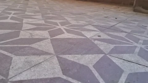 Geometric star pattern floor tiles moving in a smooth video clip Stock Footage 337897082