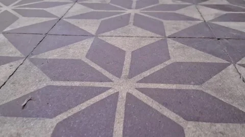 Geometric star pattern tiled floor showing smooth panning motion video footage Stock Footage 337897029