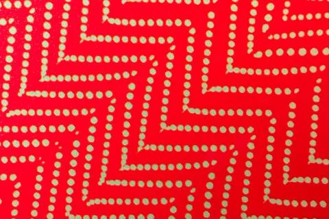 Geometric texture, red surface with dots and lines, holiday and festive box Stock Photos