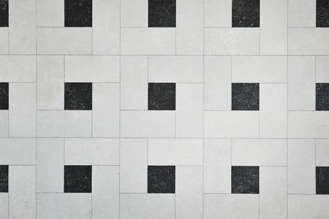 Geometric Tile Pattern With Light Gray Blocks And Black Squares Across The Wall  写真素材