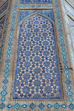 Geometric tilework panel on the exterior of Bibi-Khanym Mosque in Samarkand.. Stock Photos