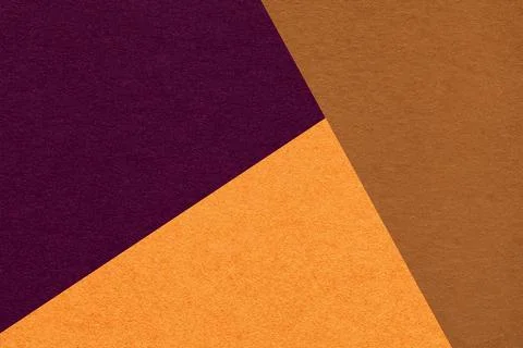 Geometric triangular dark wine l orange brown textured paper background wit.. Foto stock