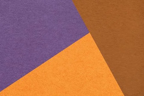 Geometric triangular orange brown violet textured paper background with cop.. Illustrazione stock