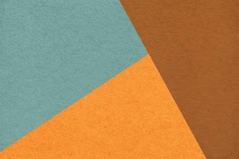 Geometric triangular pale teal orange brown textured paper background with .. Illustrazione stock