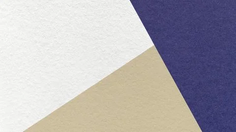 Geometric triangular white, beige, dark blue textured paper background with.. Stock Photos