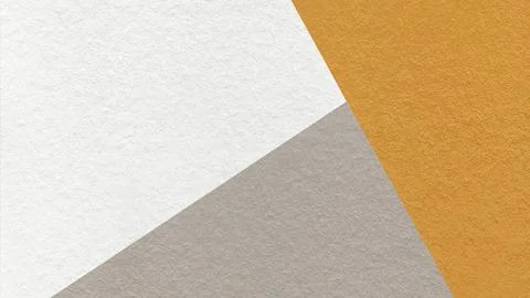 Geometric triangular white, beige, mustard textured paper background with c.. 库存照片