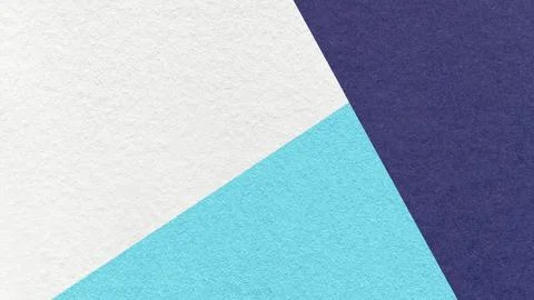 Geometric triangular white, light blue, navy textured paper background with.. Stock Photos