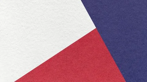 Geometric triangular white, red, dark blue textured paper background with c.. Foto stock