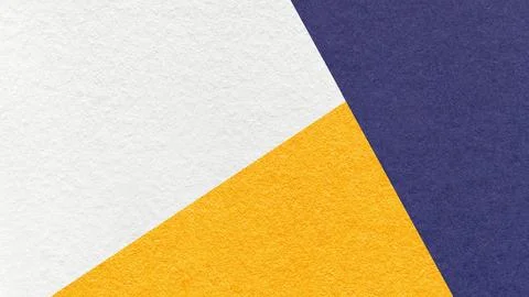 Geometric triangular white, yellow, dark blue textured paper background wit.. 库存照片