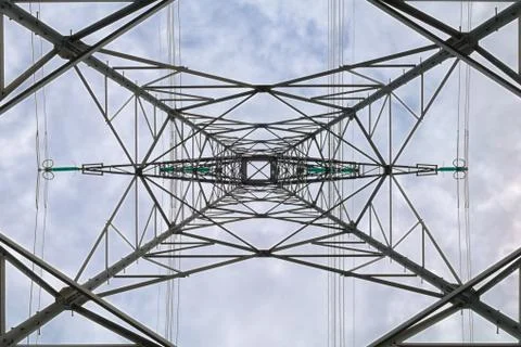 Geometric view under of a high voltage pylon Stock Photos