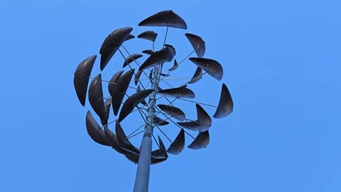 Geometric Wind Spinner from Underneath - Slow Stock Footage 321610570