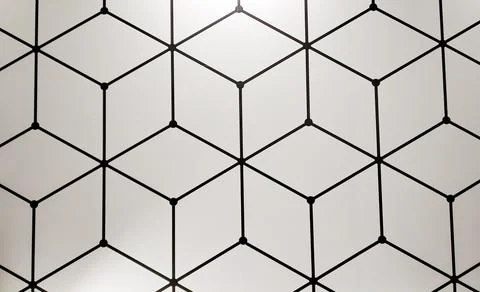 Geometrical pattern with black line cubes on a white wall 스톡 사진