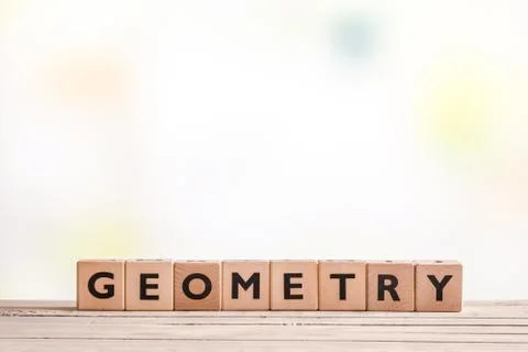 Geometry lessons sign on a table Stock Photos