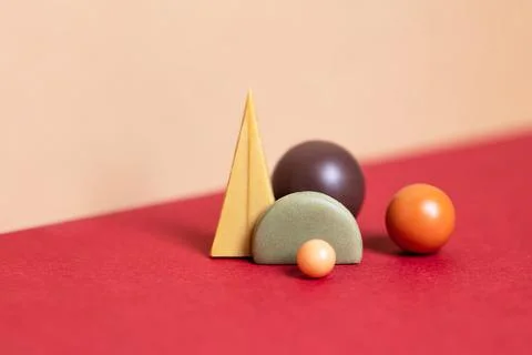 Geometry set abstract composition. Simple figures on red and beige background Stock Photos