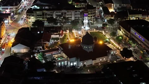 George Town at night with a large building in the center 스톡 동영상 332145852