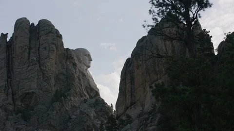 George Washington framed between rocks at Mount Rushmore National Memorial, Stock Footage 101281819