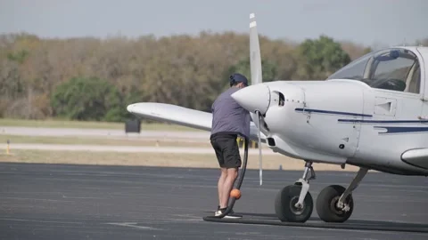 Georgetown, Tx airport, Student pilot refueling small pilot training airplane Stock Footage 165527286