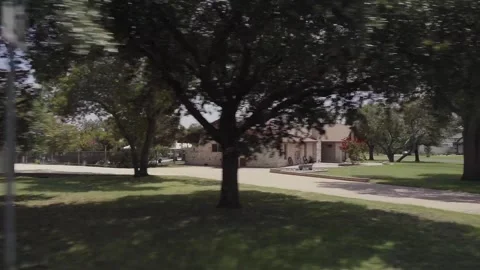 Georgetown, Tx Driving Past Middle Class Homes in Tree Lined Neighborhood Stock Footage 340846653