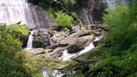 Georgia Anna Ruby Falls  A zoom in on water flowing over rocks at Anna Ruby Stock Footage 241693628