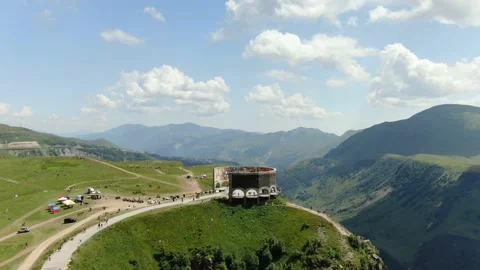 Georgia, Gudauri, summer. Drone view of Russia Georgia Friendship Monument. Stock Footage 168009054