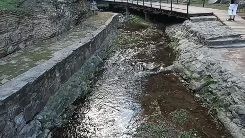 Georgia. A small river flows in a mountainous area Stock Footage 311910321