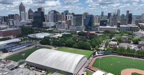 Georgia Tech playing fields below the Atlanta skyline in Georgia Stock Footage 311772808