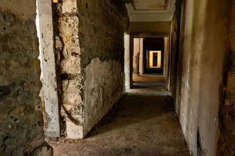 Georgia Tskaltubo abandoned soviet luxury sanatory building dark corridor Stock Photos
