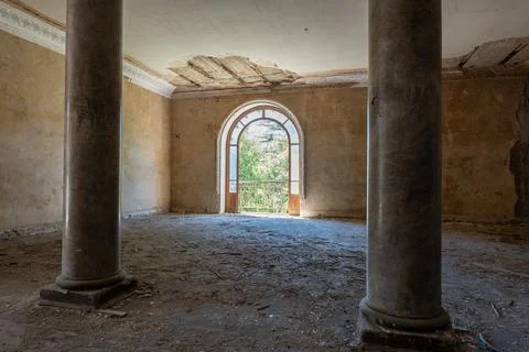 Georgia Tskaltubo abandoned soviet luxury sanatory building arc window column Stock Photos